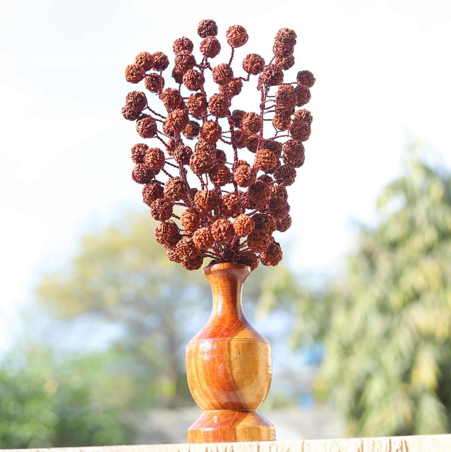 Panch mukhi Rudraksha bouquet with wooden vase